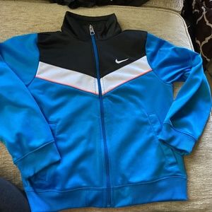 Boys size 7 Nike light jacket blue and black